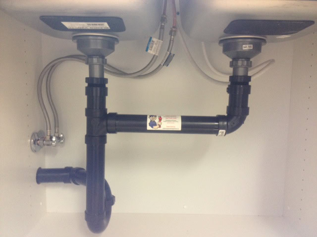 Plumbers Replacing Sink